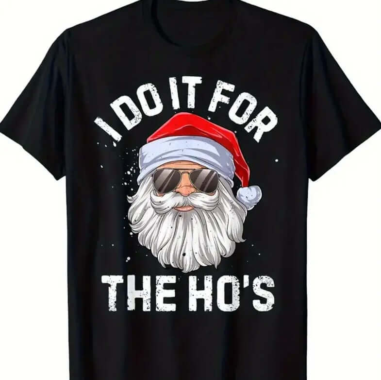 Men's Printed Short Sleeved T-shirt featuring Santa graphic with sunglasses and text 'I DO IT FOR THE HO'S' on a black background.